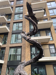 Eagle top bronze spiral sculpture Chelsea creek London