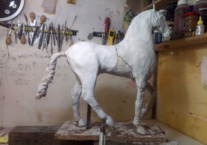 horse sculpture dry cracked clay mould maker studio